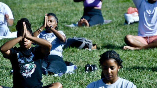Participants of Just Breathe STL yoga session led by The Collective STL