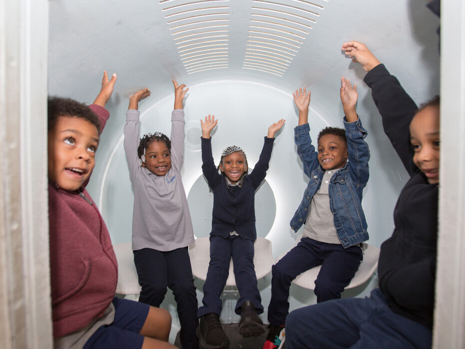 Journey Fund kids in Arch Tram