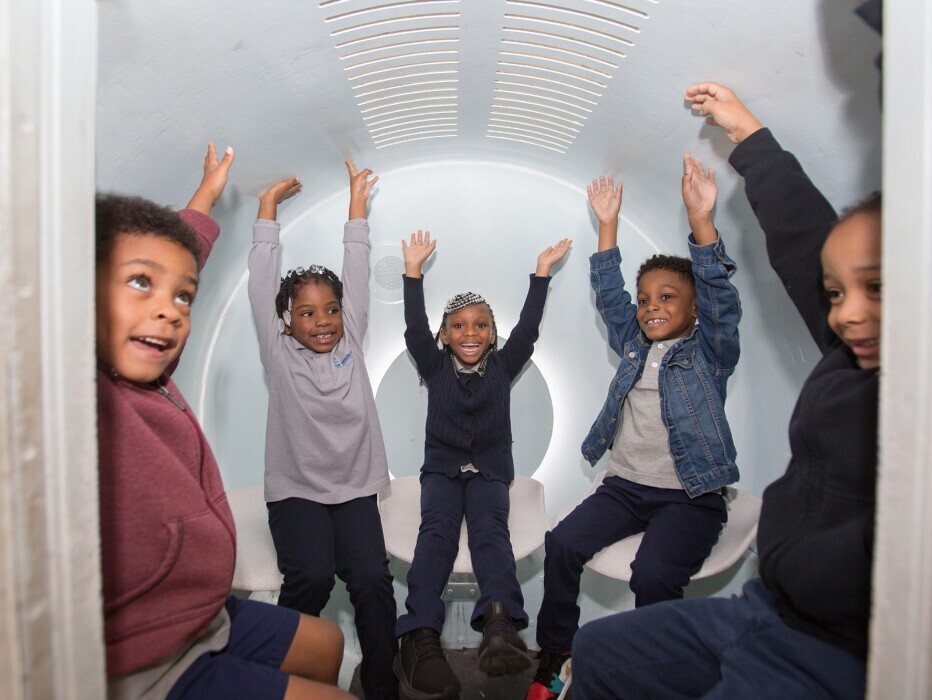 Journey Fund kids riding the Tram