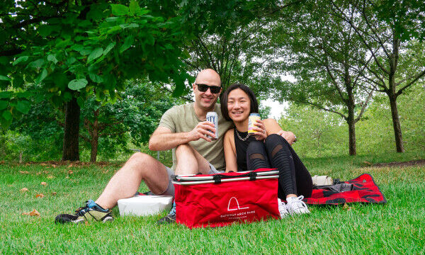 Picnic attendees with basket